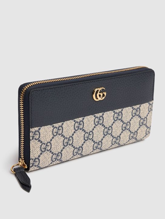 Luisaviaroma Portafoglio in tela GG Marmont con zip In Saldo