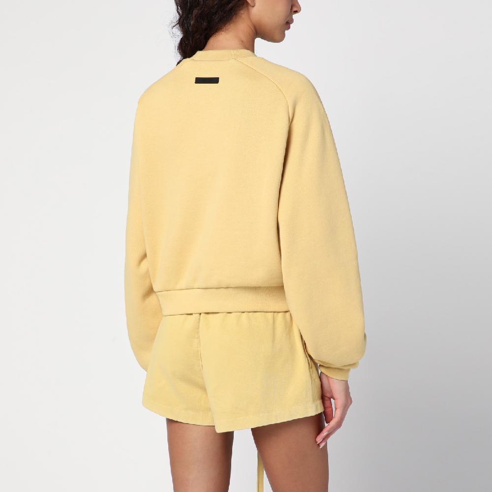 Fear of God Essentials Felpa cropped ambra con logo Offerte