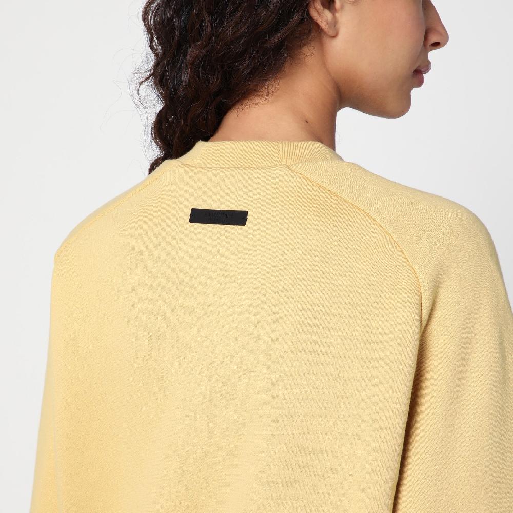 Fear of God Essentials Felpa cropped ambra con logo Offerte