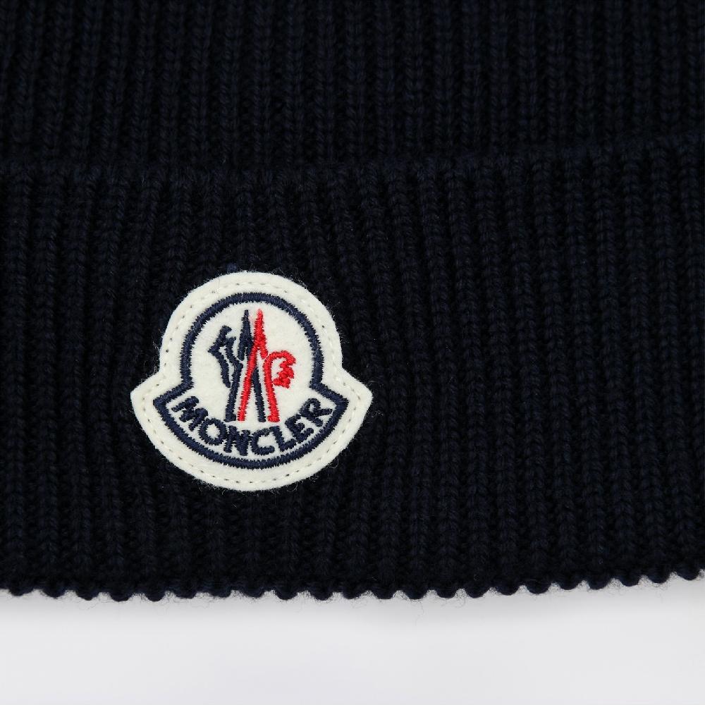 Moncler Cuffia blu in lana con patch logo Sottocosto