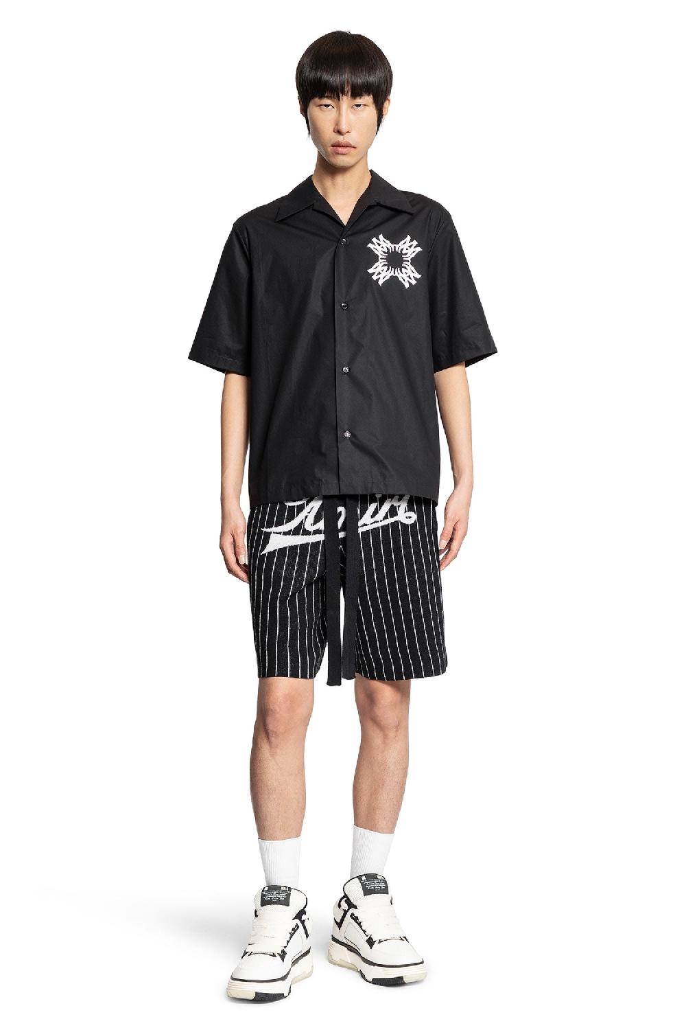 Antonioli AMIRI MAN BLACK&WHITE SHORTS & SKIRTS 50% di sconto con spedizione gratuita