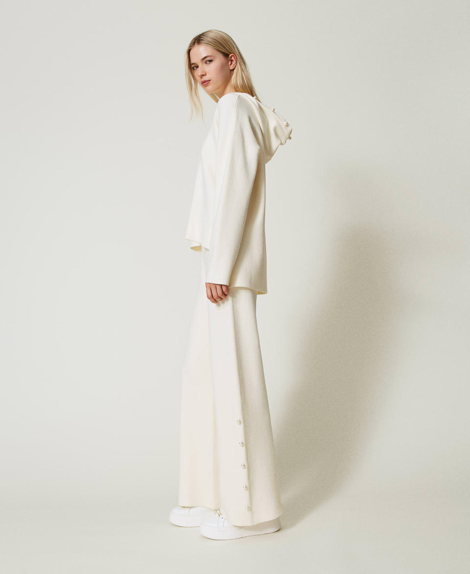 Twin Set Pantaloni wide leg in maglia con perle Vendita